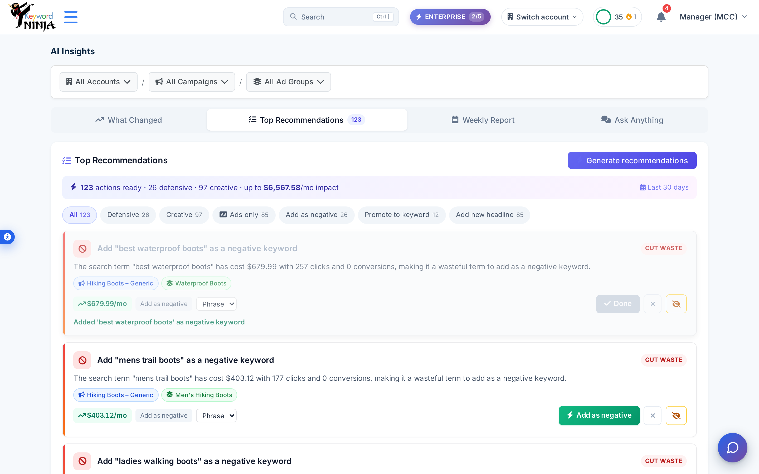 A recommendation card after applying: "Done" button and "Added ... as negative keyword" confirmation